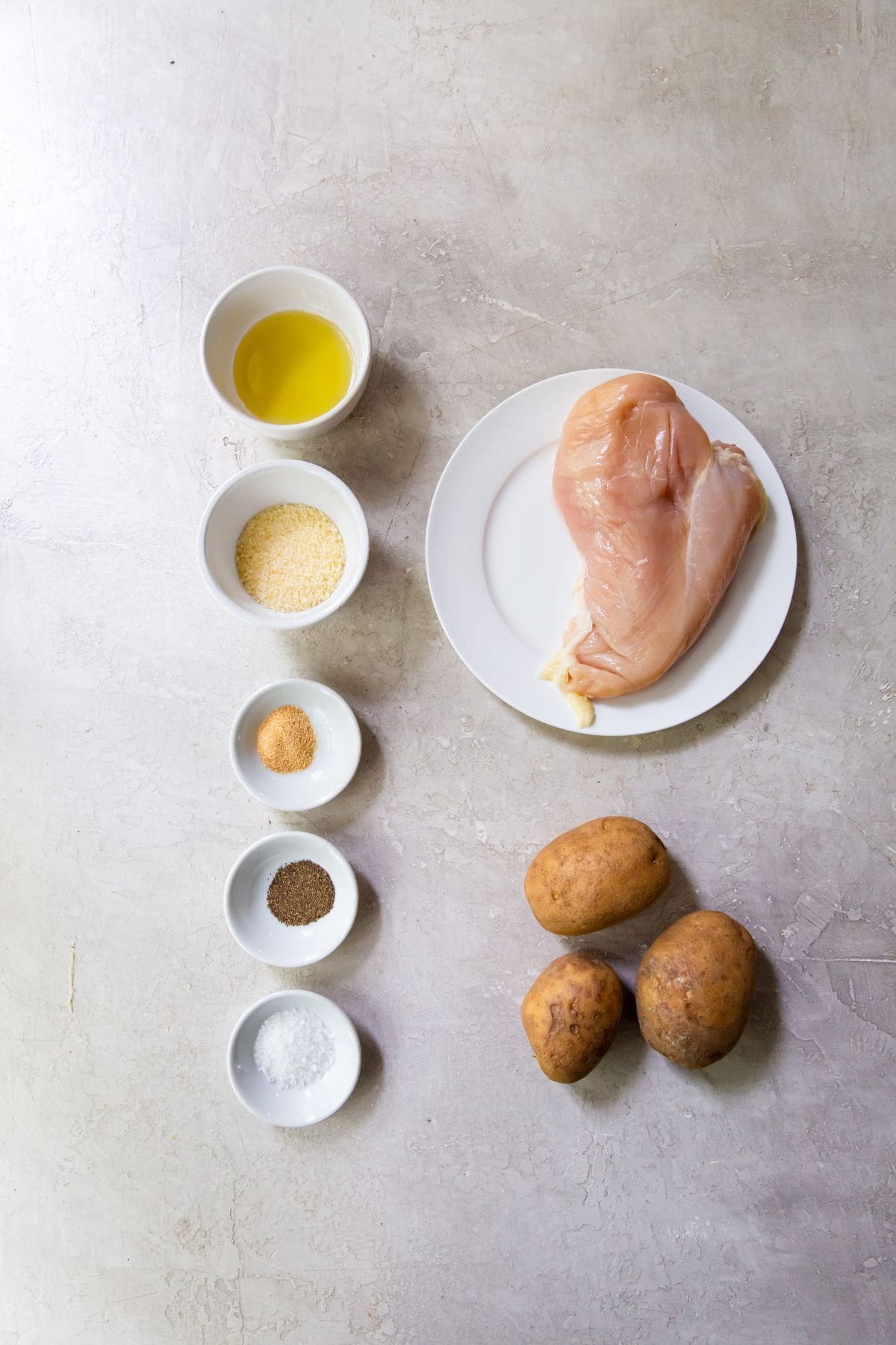 Air Fryer chicken and potatoes ingredient photo (chicken breast, potatoes, salt, pepper, garlic, parmesan, avocado. oil)