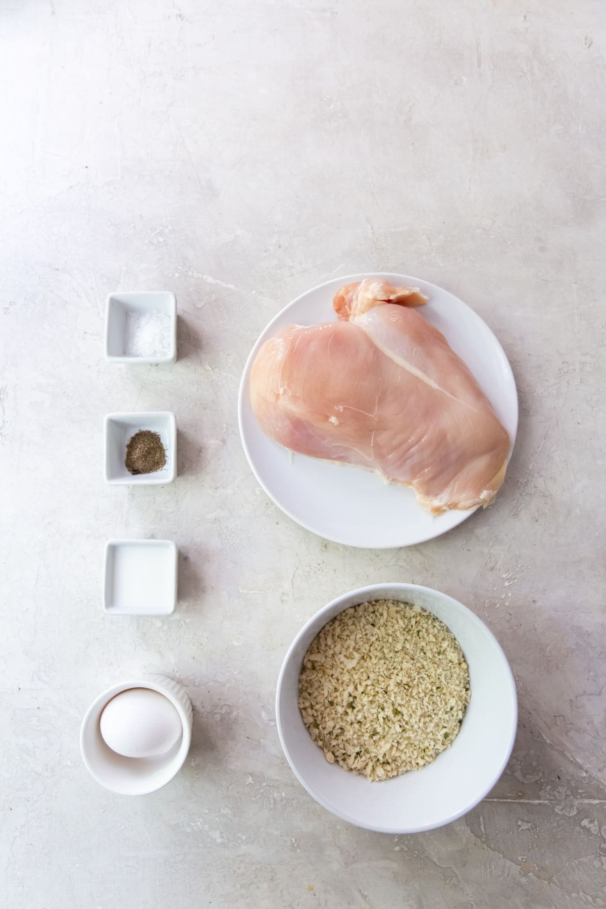 Ingredient photo for the chicken. (chicken breast, bread crumbs, salt, pepper, egg, milk)