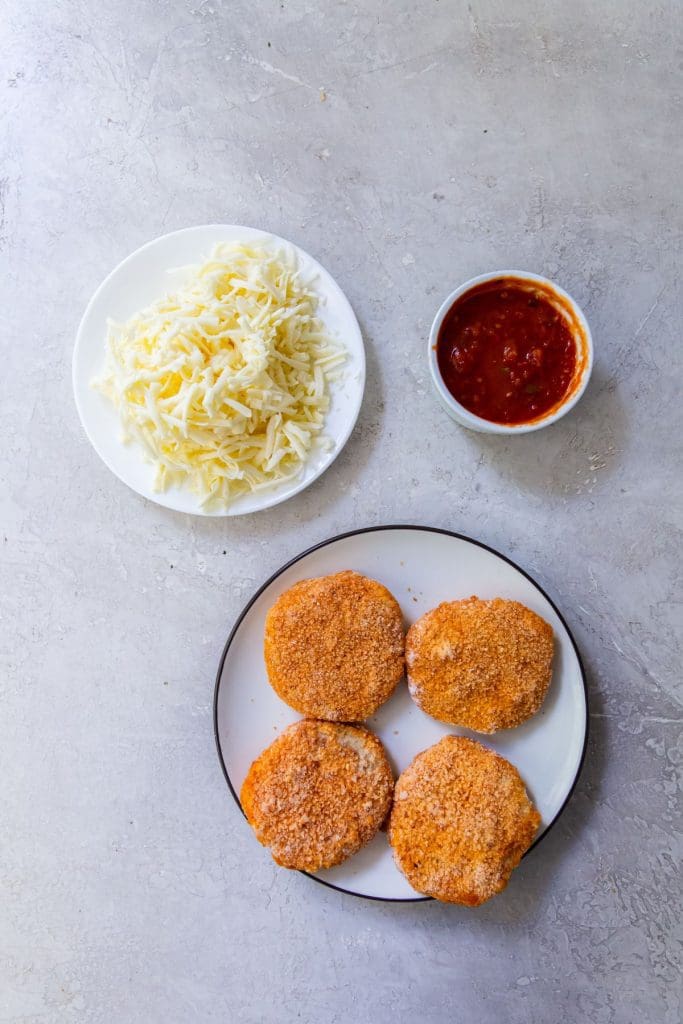 Ingredient photo for Air Fryer chicken parm with chicken patty (frozen chicken patties, mozzarella, Pizza sauce)