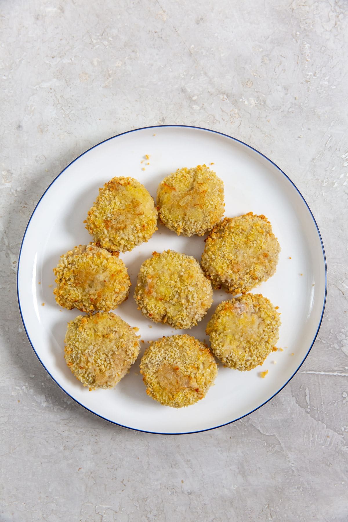 white plate with homemade air fryer chicken nuggets on it