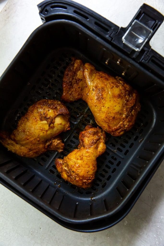 Trader Joe's Shawarma chicken thighs in the air fryer basket cooked