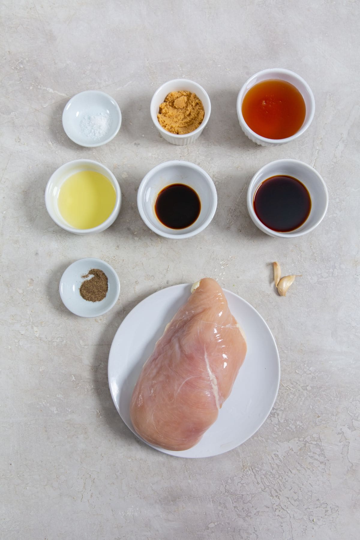 ingredient photo for air fryer honey glazed chicken breast (chicken, salt, black pepper, avocado oil, garlic, honey, soy sauce)