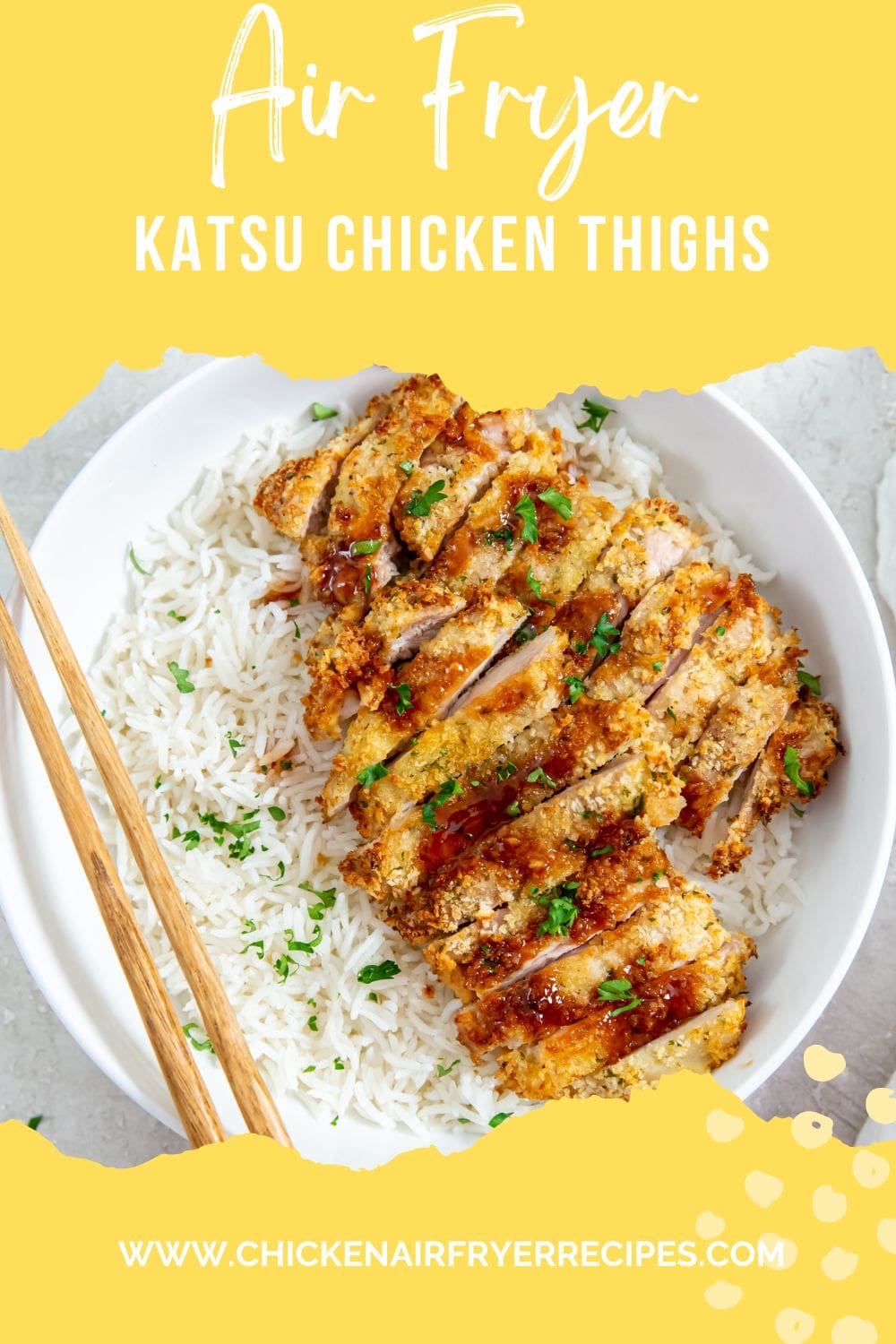 chicken and rice in a white bowl. chopsticks on the side of the bowl parsley and white towel in the back