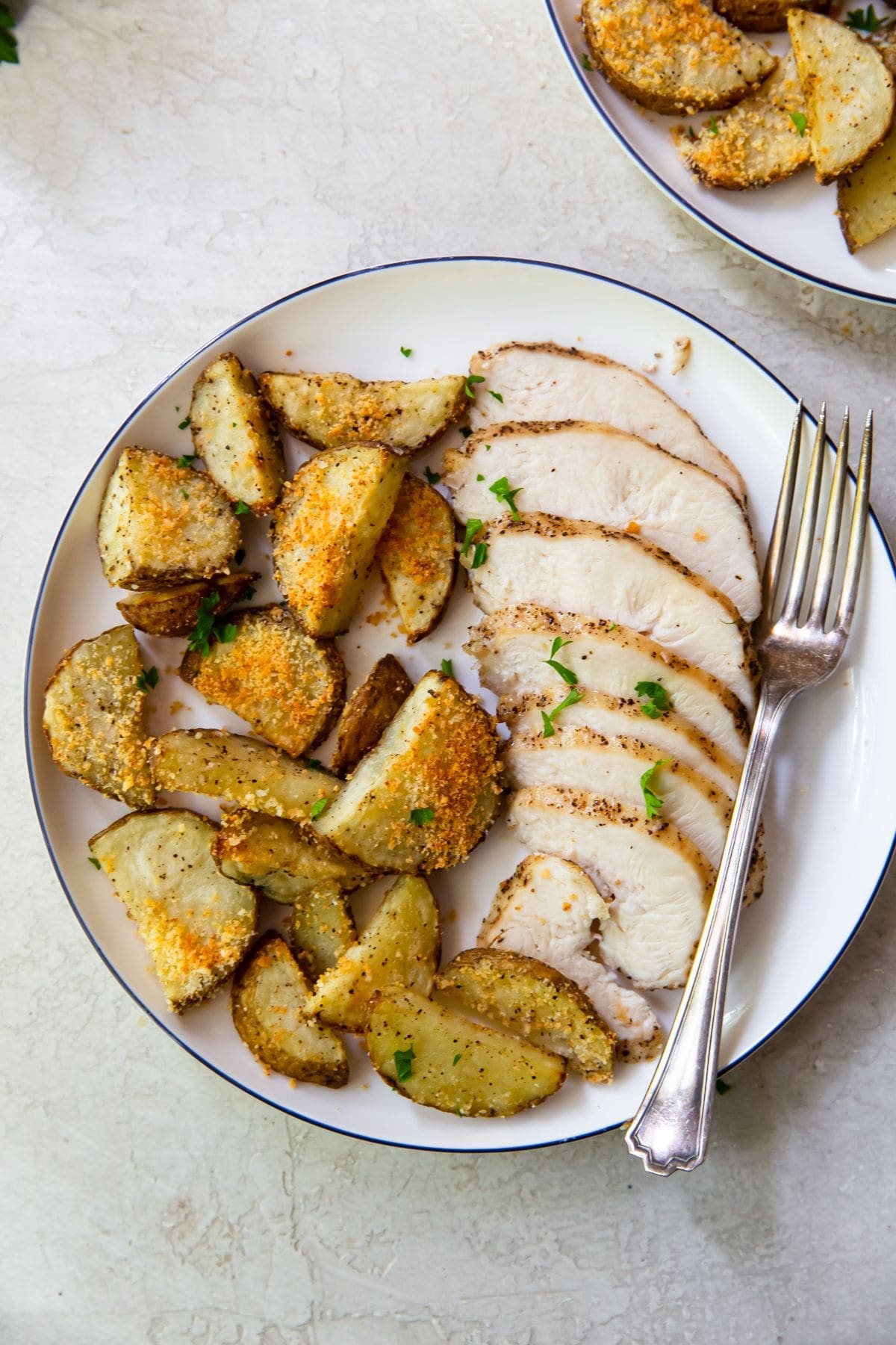 The Best Air Fryer Chicken Breast Recipes Two Plates Filled with Chicken Breast and Potatoes