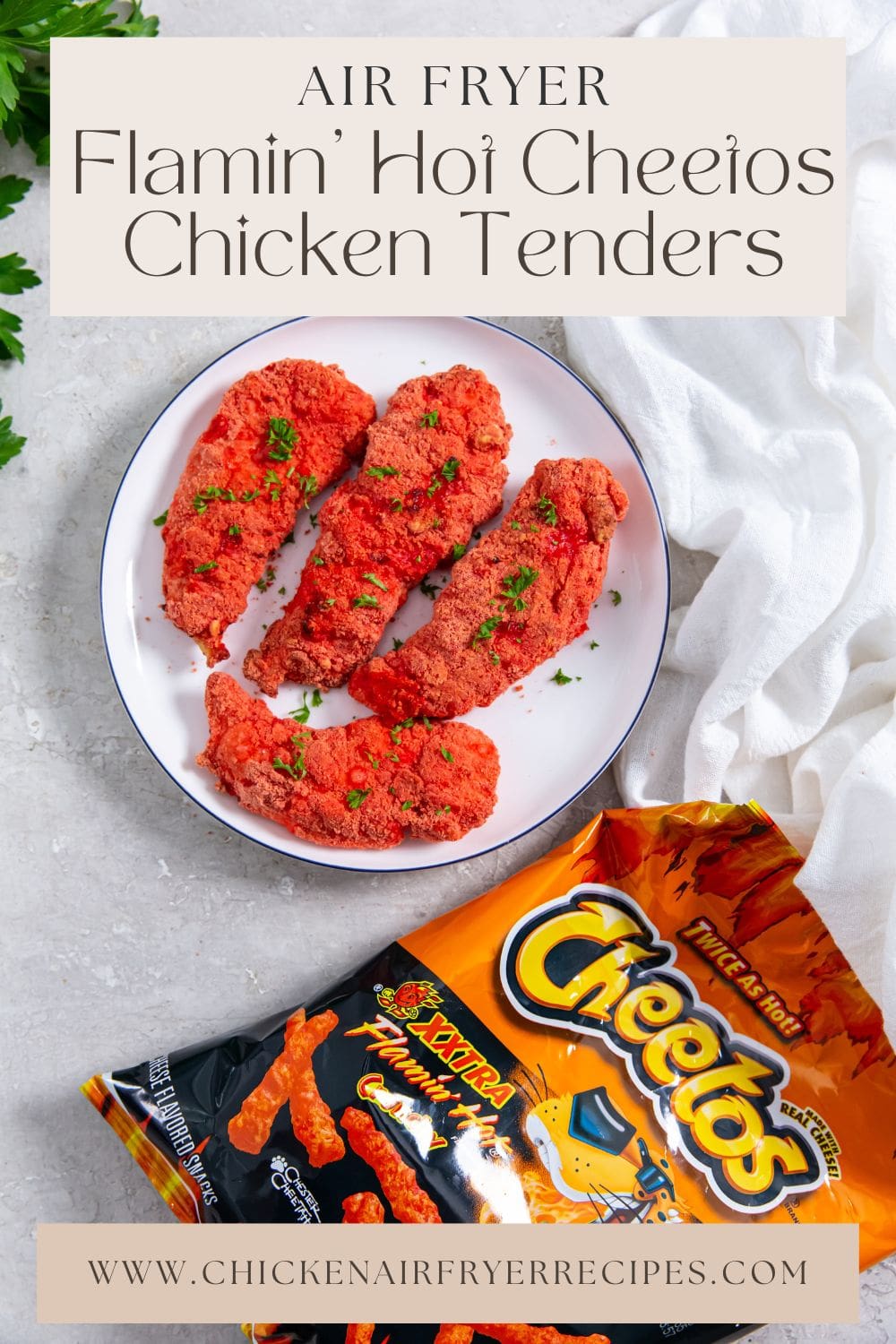 chicken on a plate Cheetos bag next to iy