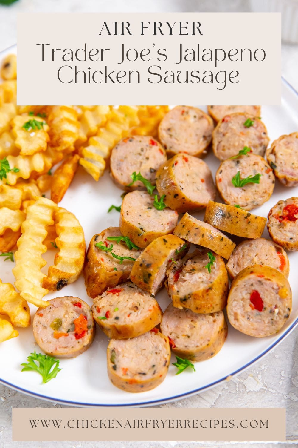 white plate with chicken sausage and fries on the plate. parsley, ketchup and white towel in the background