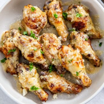 white bowl with wings inside