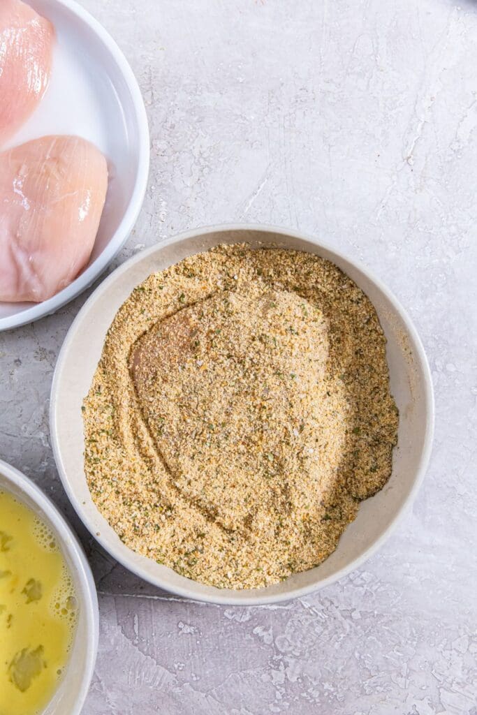 chicken cutlet coated in bread crumbs