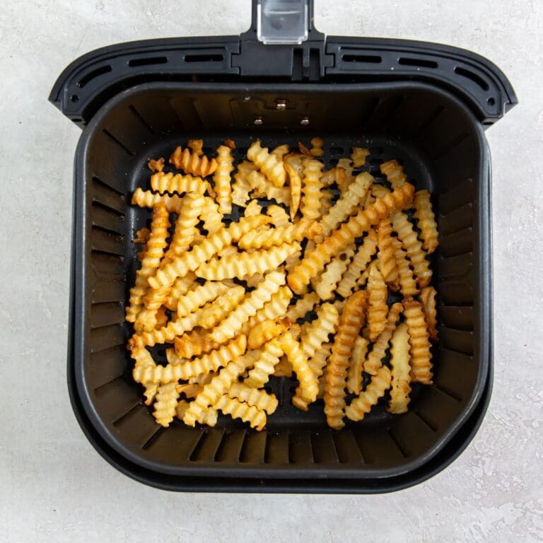 Crinkle cut French fries cooked in an air fryer.