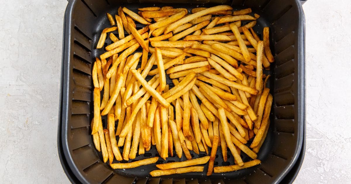 Air fryer frozen French fries.