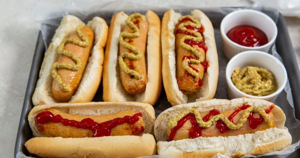 Chicken Recipes That Picky Eaters Will Love a Baking Tray Filled with Easy Air Fryer Trader Joe's Chicken Sausage