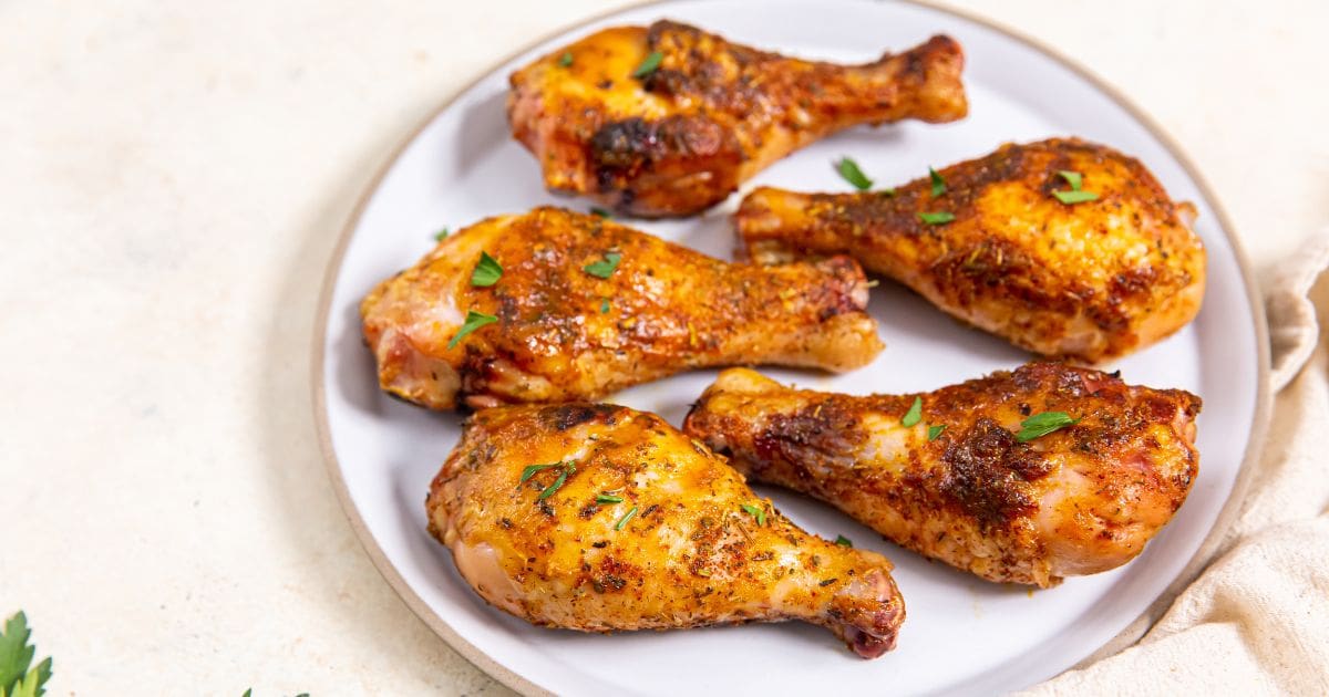 These 20 Chicken Recipes Are Everything You Need Right Now Close Up of a Plate of Smoked Chicken Drumsticks