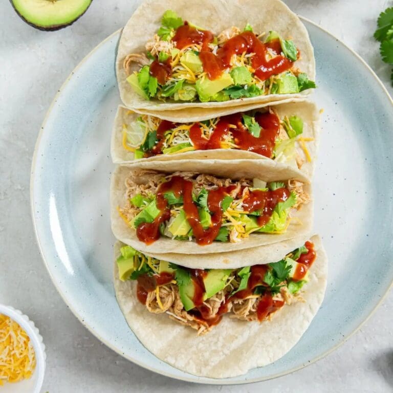 Midweek Meal Plan Overhead View of a Plate of Shredded Chicken Tacos