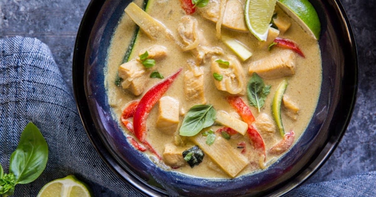 Recipes We Make Close Up of a Bowl of Instant Pot Green Chicken Curry (Thai Green Curry Recipe)