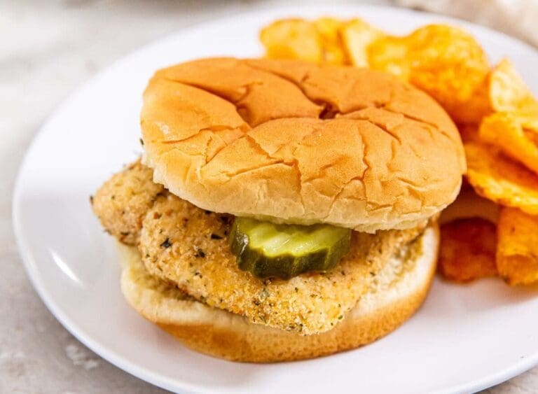 10 Air Fryer Chicken Recipes Close Up of a Chicken Sandwich with Chips on a Plate