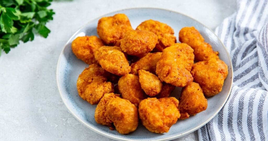 Buffalo Air Fryer Chicken Wings Close Up of a Plate of Tyson Boneless Chicken Bites in the Air Fryer