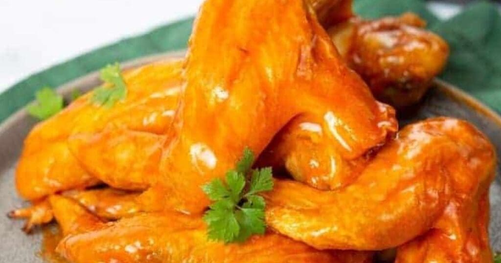 Buffalo Air Fryer Chicken Wings Copycat Buffalo Wild Wings Buffalo Wings on a Plate with Parsley 