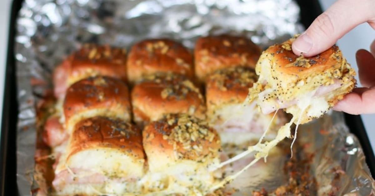 Easy Appetizers Close Up of a Baking Sheet with Easy Ham and Cheese Sliders