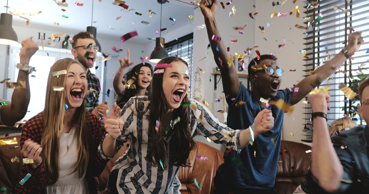 Super Bowl Air Fryer Recipes People Cheering with Confetti Falling Around