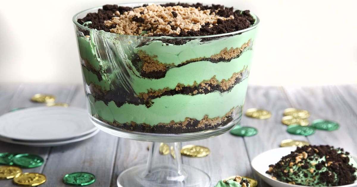 St. Patrick's Day Desserts for Kids Close Up of a Parfait Dish Filled with Layers of Brownies and Green Frosting