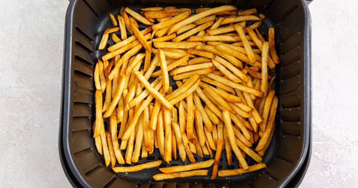 St. Patricks Day Air Fryer Recipes an Air Fryer Basket Filled with Air Fryer Frozen French Fries