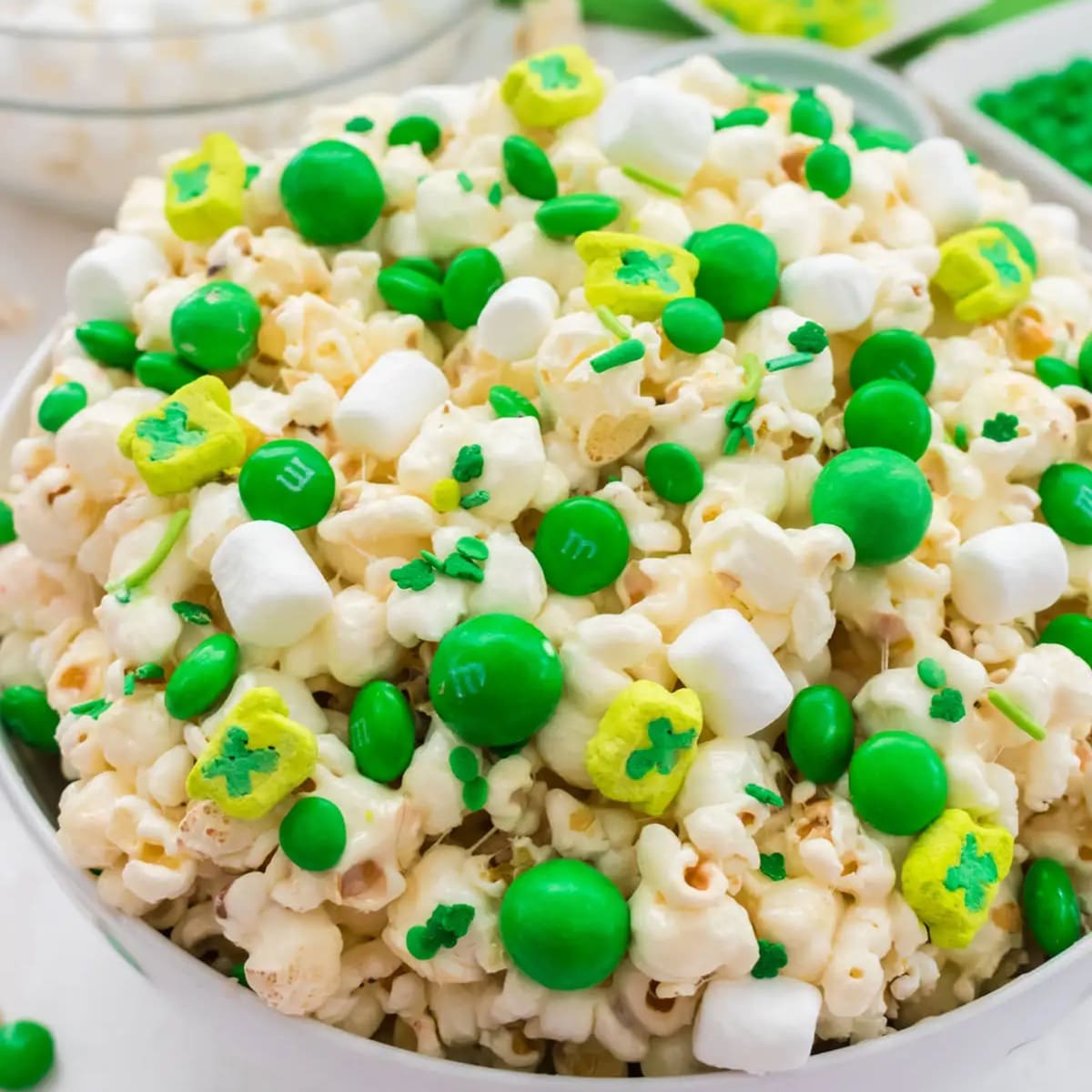 St. Patrick's Day Desserts for Kids Close Up of Popcorn Mixed With Green Candy and Marshmallows