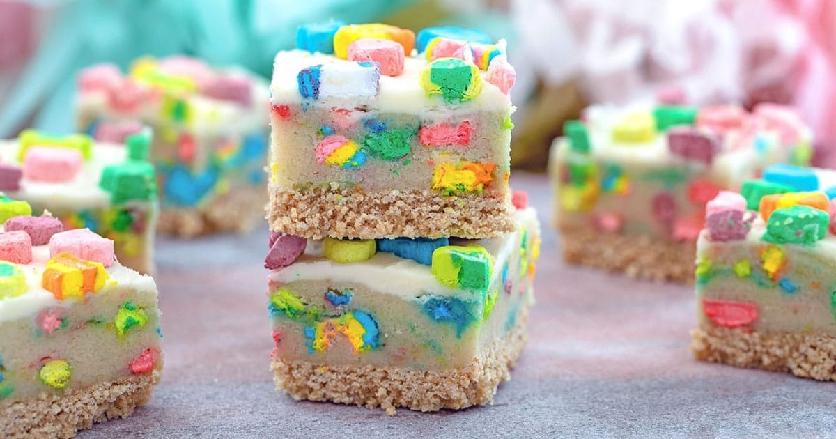 St. Patrick's Day Desserts for Kids Close Up of Cookie Dough Bars Filled and Topped with Lucky Charms Marshmallows