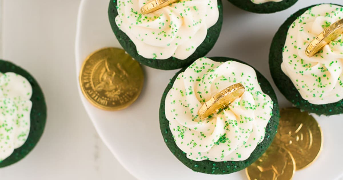 St. Patrick's Day Desserts for Kids Overhead View of Green Cupcakes Each Topped with Frosting and a Chocolate Gold Coin