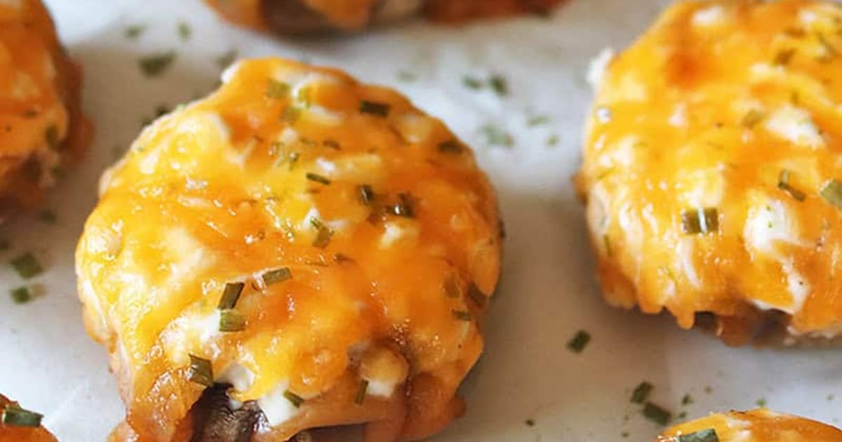 Air Fryer Side Dishes for Chicken Recipes Close Up of Air Fryer Stuffed Mushrooms on a Parchment Paper