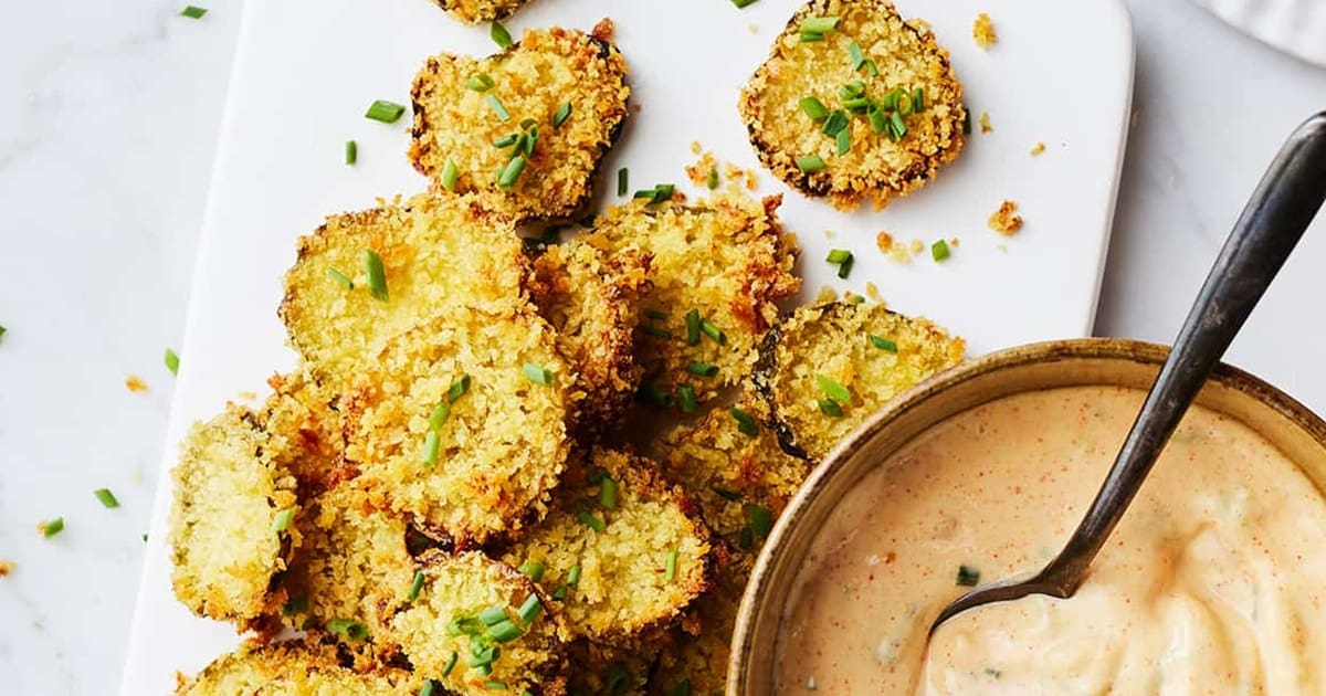 Must Make Memorial Day Recipes in your Air Fryer a Serving Platter with Air Fryer Fried Pickles and a Small Bowl of Dipping Sauce