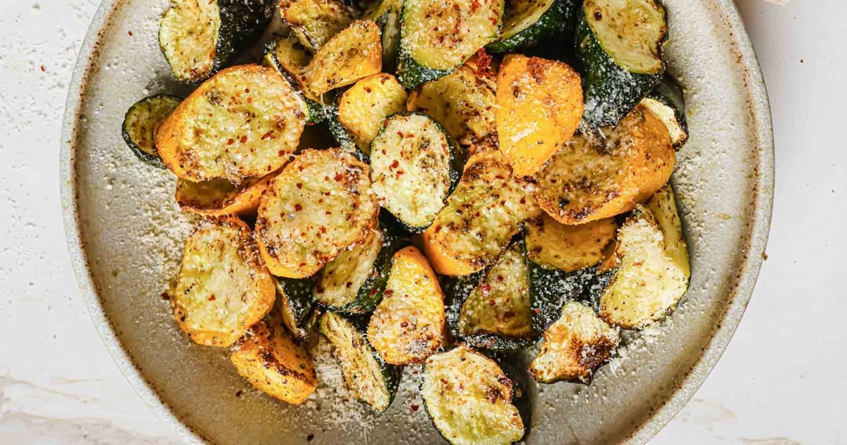 Summer Squash Air Fryer Recipes Mixed Summer Squash Chips Fried and Seasoned on a Plate