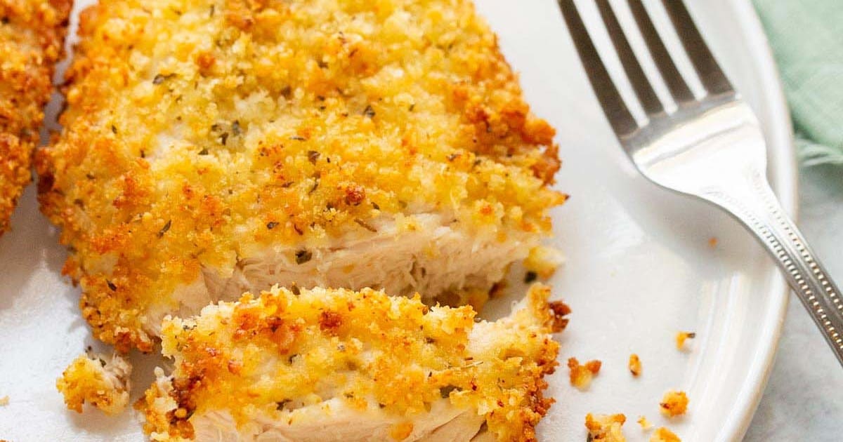 Air Fryer Parmesan Crusted Chicken Breast Recipes Close Up of Air Fryer Parmesan Crusted Chicken on a Plate with a Fork