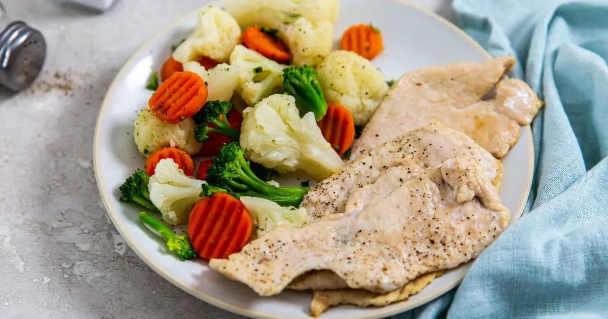 Foolproof Chicken Air Fryer Ideas a Plate of Air Fryer Thin Sliced Chicken Breast with Steamed Veggies