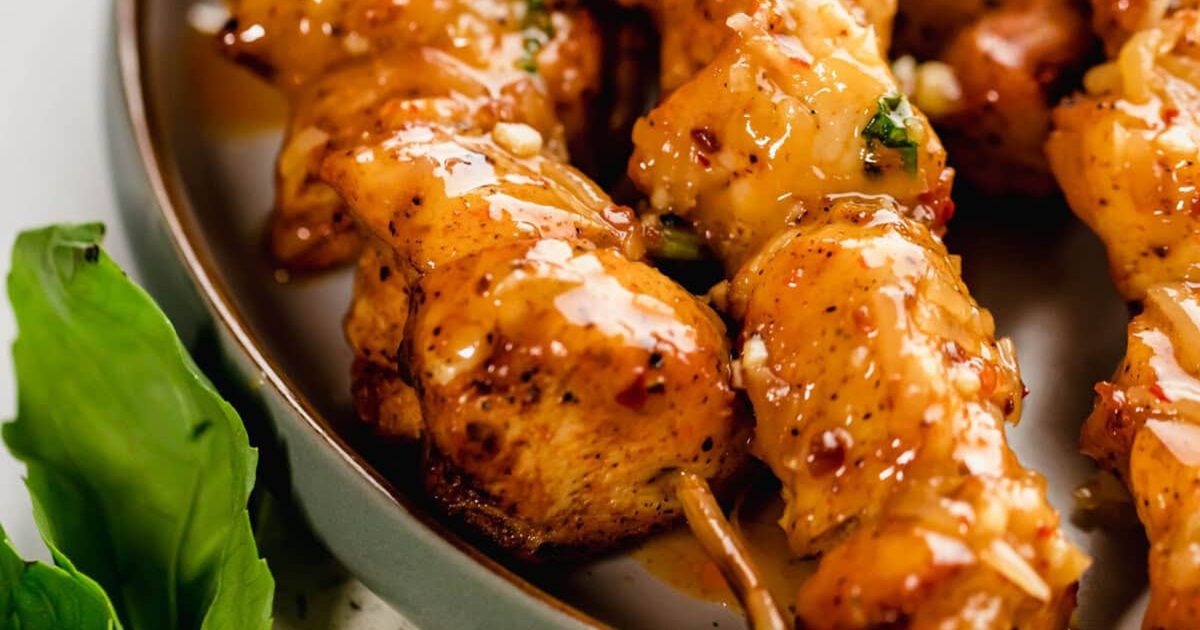 Must-Try Chicken Air Fryer Recipes for Stress-Free Meals Close Up of Chicken Skewers on a Plate