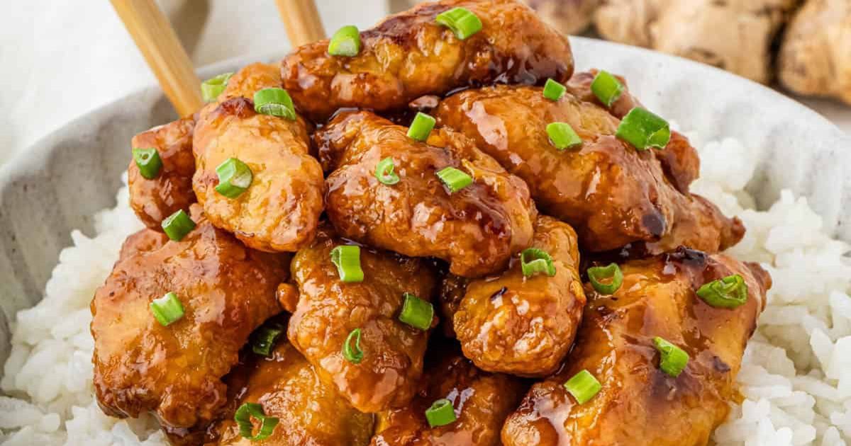 Must-Try Chicken Air Fryer Recipes for Stress-Free Meals Close Up of a Bowl of Rice Topped with Air Fryer Panda Express Orange Chicken