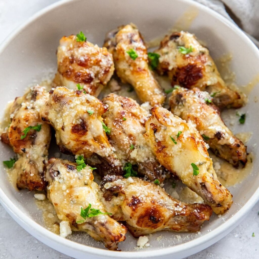 Easy Air Fryer Lunch Ideas Close Up of a Bowl Filled with Garlic Parmesan Chicken Wings