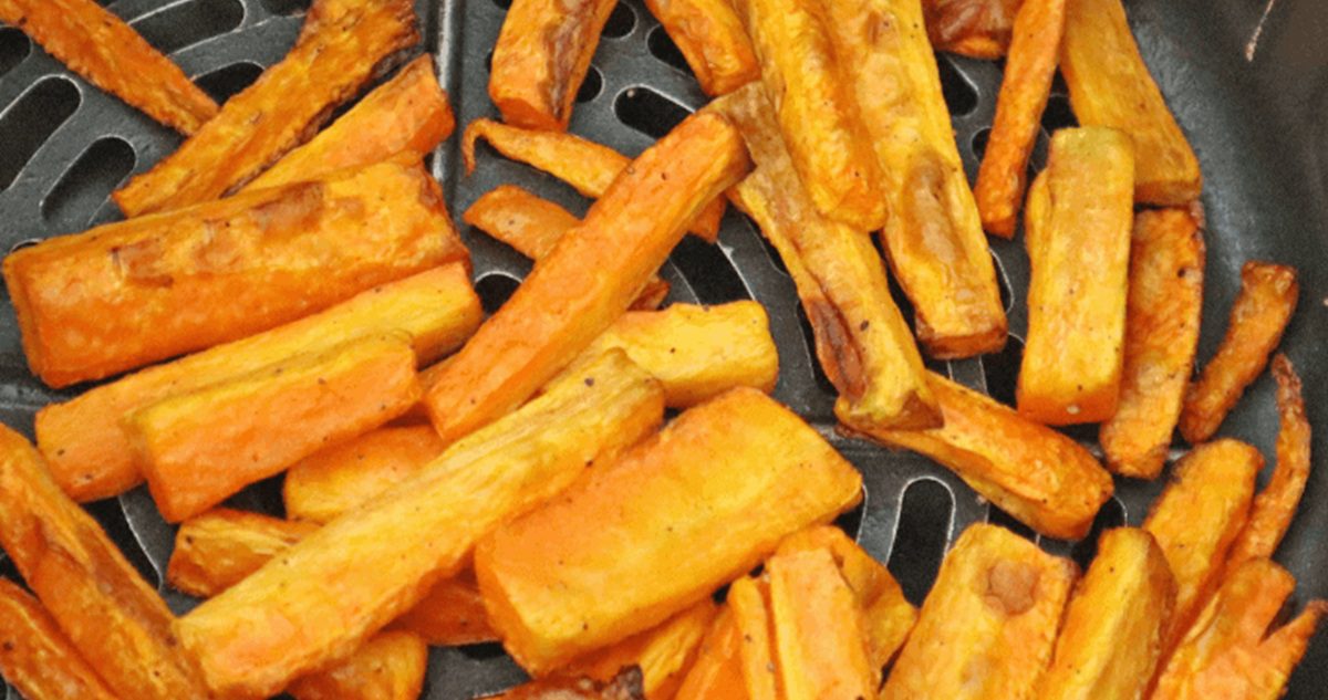Air Fryer Thanksgiving Recipes Close Up of Air Fryer Carrots in an Air Fryer Basket