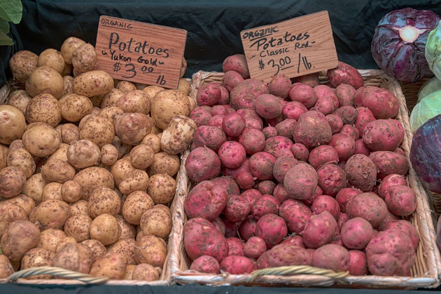 How to Make Air Fryer Red Potatoes a Pile of Red Potatoes Next to a Pile of Yukon Potatoes