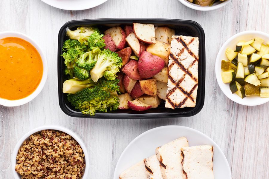 How to Make Air Fryer Red Potatoes Overhead of a Meal Prep Container of Tofu with Red Potatoes