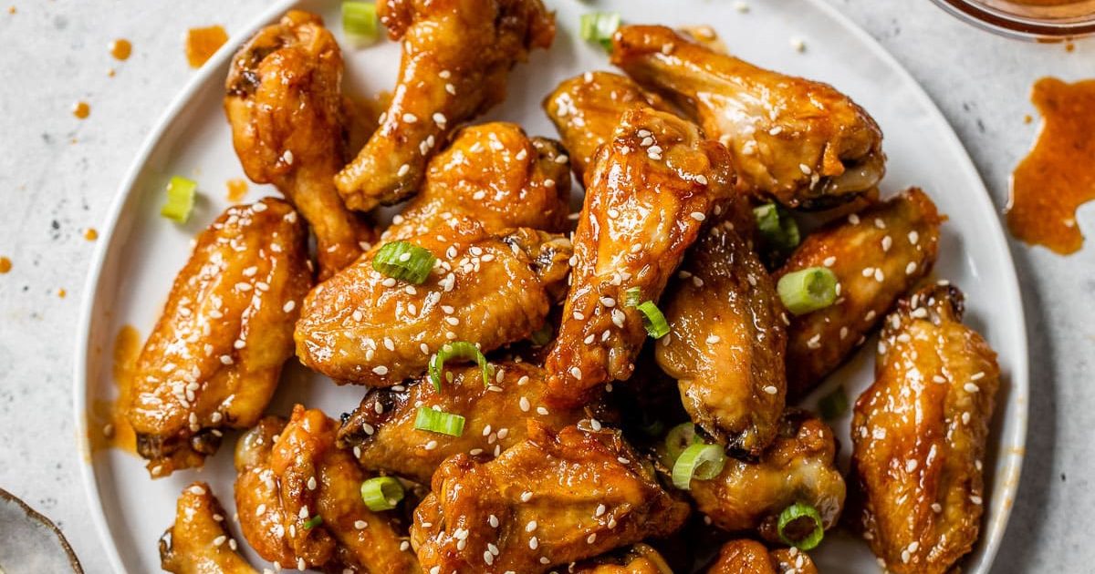 Chicken Dinners So Good Korean Chicken Wings on a Plate Garnished with Sesame Seeds