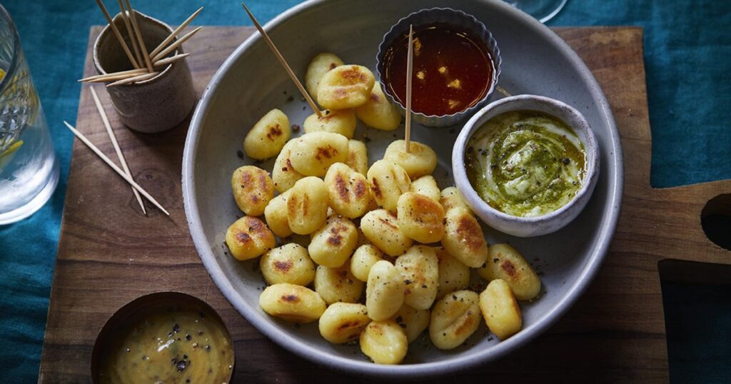 Air Fryer Christmas Party Recipes Air Fryer Gnocchi on a Platter with Dipping Sauces in Ramekins