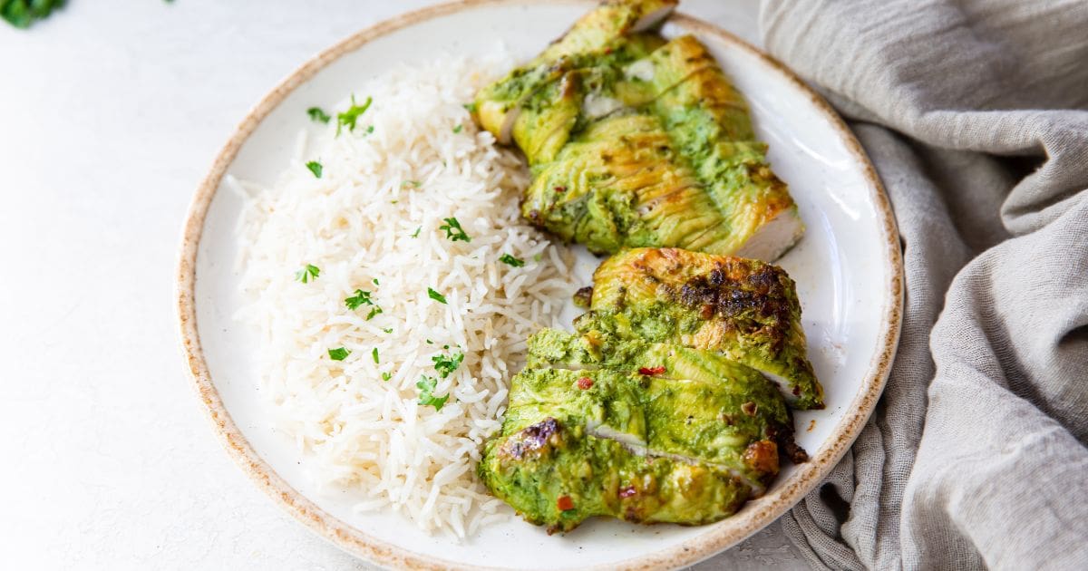 Winning Family Dinners Pesto Chicken in the Air Fryer on a Plate with Rice