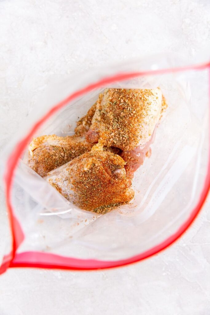 Air Fryer Keto Chicken Thighs Raw Chicken Thighs in a Ziploc Bag with Seasonings Unshaken