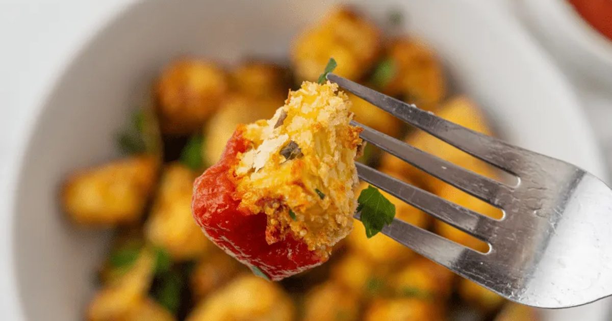 Air Fryer Easter Brunch Recipes Air Fryer Eggplant Parmesan Bites with One on a Fork Above the Rest