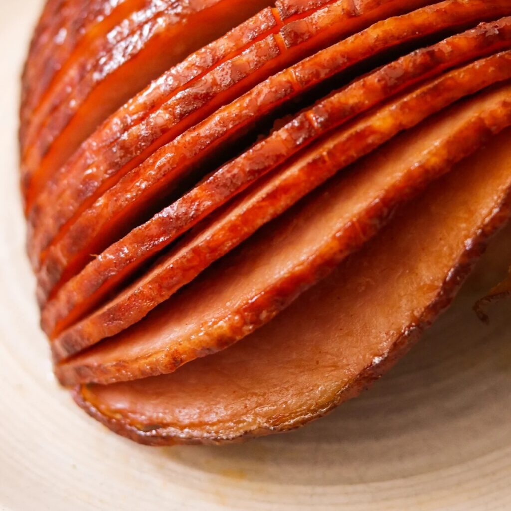 Air Fryer Easter Dinner Recipes Close Up of Ham Sliced on a Plate