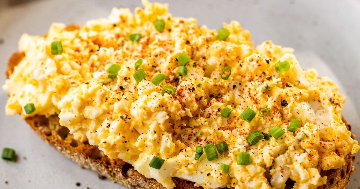 Air Fryer Easter Dinner Recipes Air Fryer Egg Salad on a Slice of Toast on a White Plate