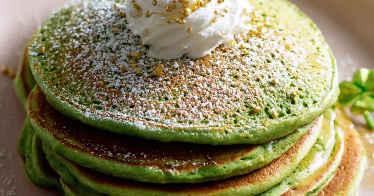 St. Patrick's Day Air Fryer Recipes Close Up of Green Pancakes Air Fryer with a Dollop of Whipped Cream
