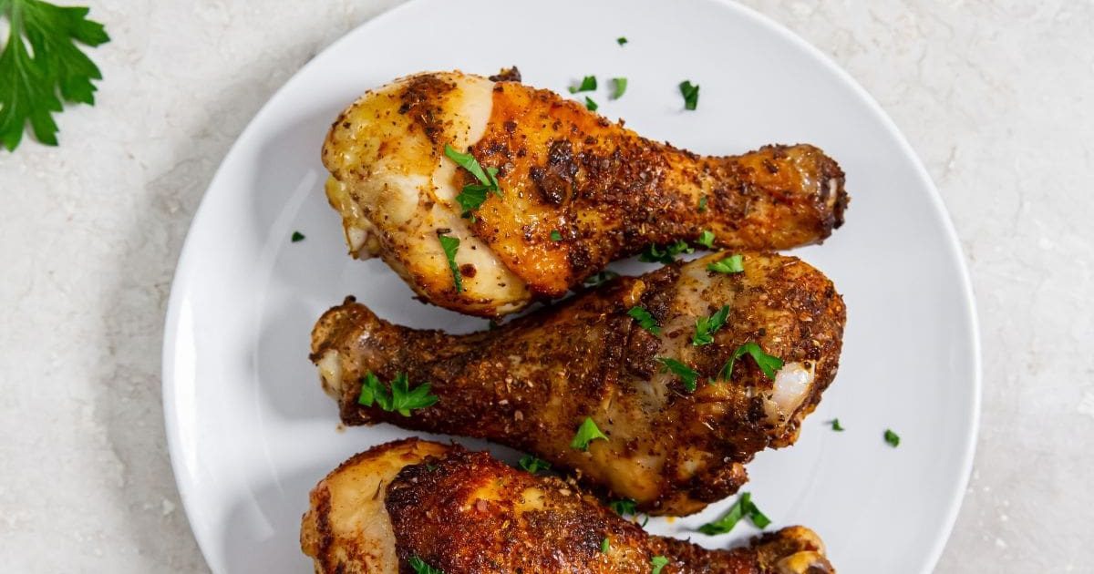 Dinner Ideas for Two Three Air Fryer Blackened Chicken Legs on a White Plate