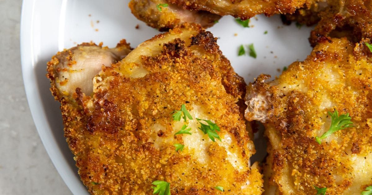 Foolproof Chicken Air Fryer Recipes Close Up of Easy Air Fryer Shake N Bake Chicken Thighs on a Plate