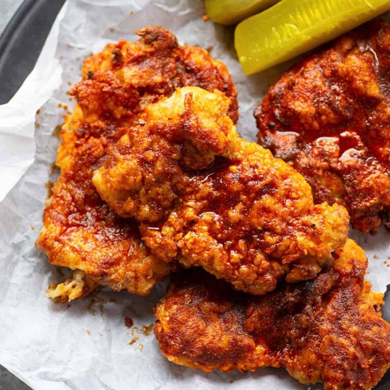 Spicy Air Fryer Chicken Recipes Close Up of Nashville Hot Chicken in a Basket with Paper